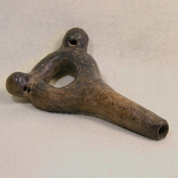 http://ancientartifax.com/images/moche_whistle.jpg
